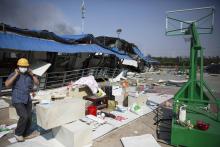 Un habitant à Tianjin après les explosions.