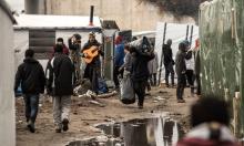 Des migrants dans la jungle de Calais.