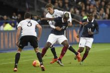 Paul Pogba Blaise Mautidi et Thomas Muller lors de France Allemagne le 13 novembre 2015.