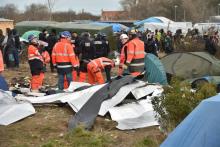 Le démontage des abris dans la partie sud de la jungle de Calais.