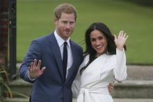 Le prince Harry et Meghan Markle pendant un match de tennis à Toronto, le 25 septembre 2017.