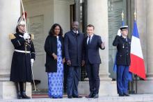 Emmanuel Macron accueille George Weah et son épouse Clar, à l'Elysee le 21 février 2018 à Paris