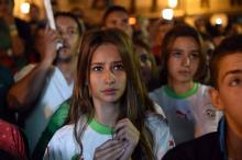 Des femmes en Algérie assistent à la diffusion sur grand écran d'un match de football lors de la Coupe du monde 2014, le 1er juillet 2014