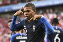 L'attaquant français Kylian Mbappé après avoir marqué un but durant le match contre le Pérou, au stade d'Ekaterinbourg, le 21 juin 2018