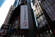 The new logo of Thomson Reuters is seen on their Times Square building on April 17, 2008 in New York. Thomson Reuters Corporation debuted on April 17 with a new logo as a global information company. C