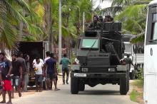 Des soldats en patrouille à Kalmunai, au lendemain des attentats-suicide à la bombe le dimanche de Pâques, le 28a vril 2019 au Sri Lanka