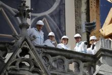 Des palissades sont installées devant la cathédrale Notre-Dame de Paris, le 13 août 2019