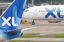 Dans cette photo, prise de photo le 22 septembre 2009, le logo de la compagnie aérienne XL Airways France est présenté lors d'un salon international des voyages à Paris.