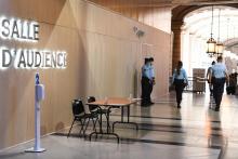 Des gendarmes devant la salle d'audience du Palais de Justice de Paris, le 8 septembre 2021, premier jour du procès des attentats du 13 novembre 2015