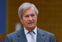 Vincent Bolloré, actionnaire majoritaire du groupe Bolloré, arrive à une audition d'une commission parlementaire sur la concentration dans les médias, le 19 janvier 2022